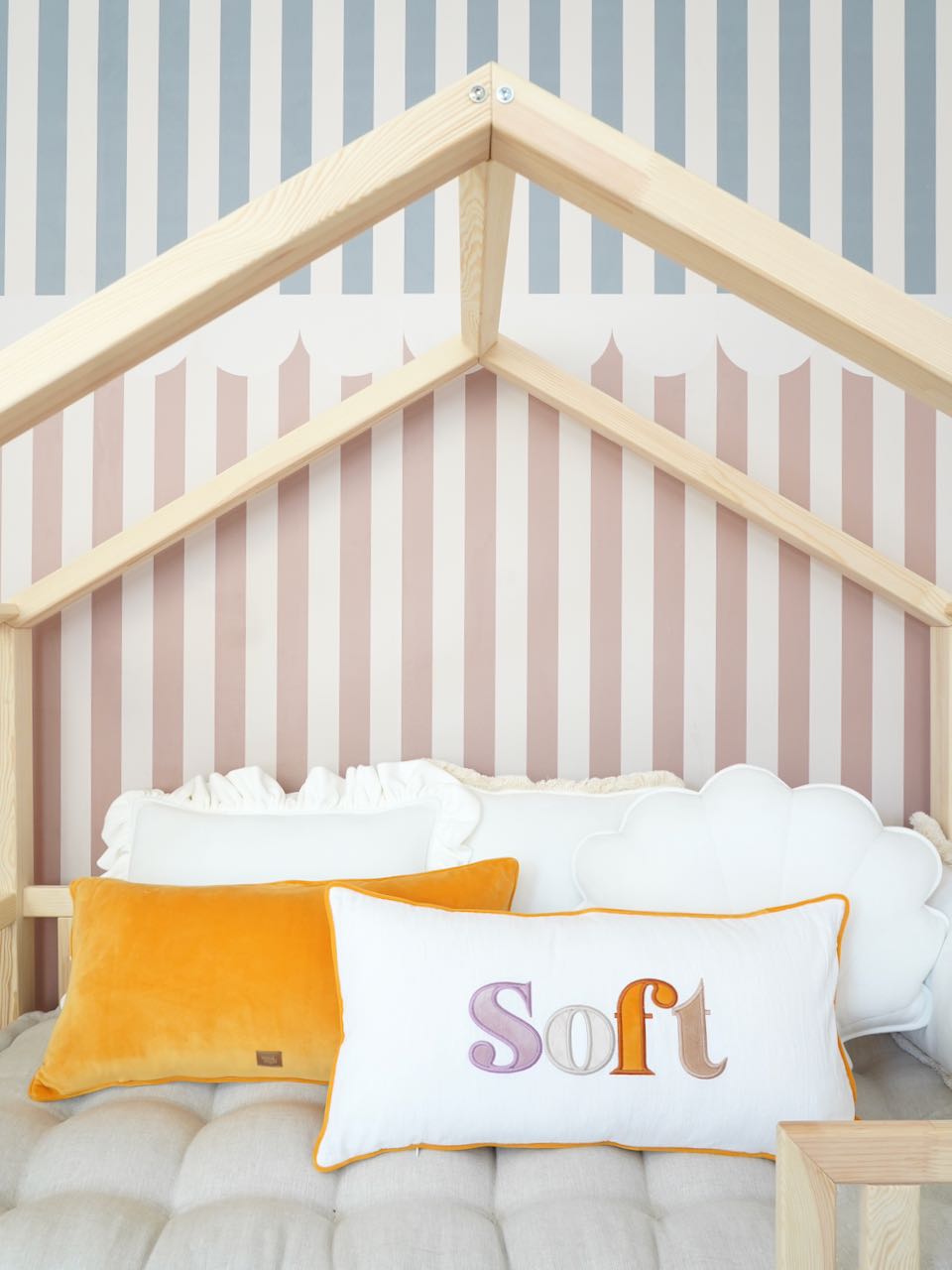 Decorative pillowcase with a pastel embroidered inscription "Soft"